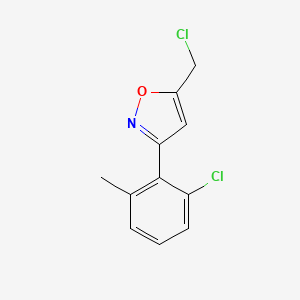 molecular formula C11H9Cl2NO B8225777 5-(Chloromethyl)-3-(2-chloro-6-methylphenyl)-1,2-oxazole 