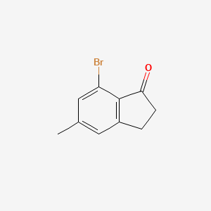 molecular formula C10H9BrO B8226305 7-Bromo-5-methyl-2,3-dihydro-1H-inden-1-one 
