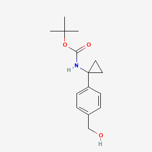 molecular formula C15H21NO3 B8228099 Tert-butyl 1-(4-(hydroxymethyl)phenyl)cyclopropylcarbamate 