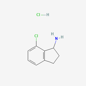 molecular formula C9H11Cl2N B8228308 7-Chloro-2,3-dihydro-1H-inden-1-amine hydrochloride 