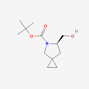 molecular formula C12H21NO3 B8228645 tert-butyl (6R)-6-(hydroxymethyl)-5-azaspiro[2.4]heptane-5-carboxylate 