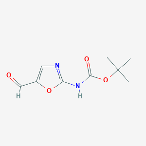 molecular formula C9H12N2O4 B8230911 tert-butyl N-(5-formyl-1,3-oxazol-2-yl)carbamate 