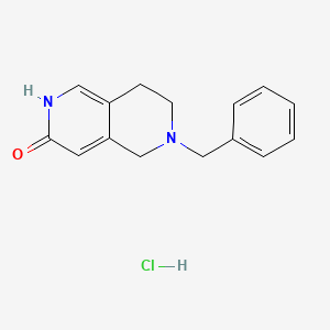 6-Benzyl-2,5,7,8-tetrahydro-2,6-naphthyridin-3-one;hydrochloride