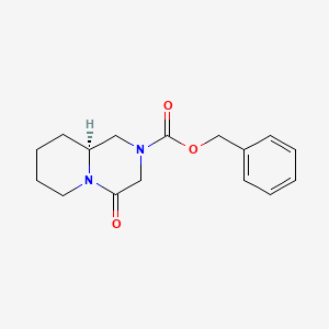 molecular formula C16H20N2O3 B8231650 benzyl (9aS)-4-oxo-3,6,7,8,9,9a-hexahydro-1H-pyrido[1,2-a]pyrazine-2-carboxylate 
