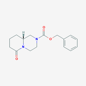 molecular formula C16H20N2O3 B8232682 benzyl (9aR)-6-oxo-3,4,7,8,9,9a-hexahydro-1H-pyrido[1,2-a]pyrazine-2-carboxylate 