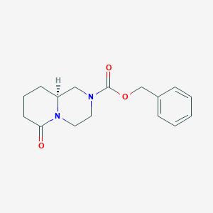 benzyl (9aS)-6-oxo-3,4,7,8,9,9a-hexahydro-1H-pyrido[1,2-a]pyrazine-2-carboxylate
