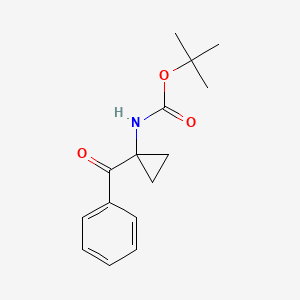 molecular formula C15H19NO3 B8237723 tert-butyl N-(1-benzoylcyclopropyl)carbamate 