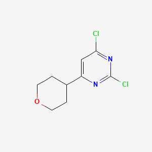 molecular formula C9H10Cl2N2O B8237910 2,4-Dichloro-6-(tetrahydro-2H-pyran-4-yl)pyrimidine 