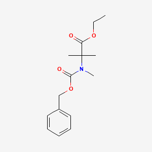 molecular formula C15H21NO4 B8238306 Ethyl 2-{[(benzyloxy)carbonyl](methyl)amino}-2-methylpropanoate 