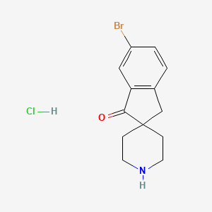 molecular formula C13H15BrClNO B8239624 6-Bromospiro[indene-2,4'-piperidin]-1(3H)-one hydrochloride 