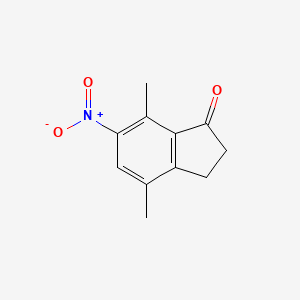 molecular formula C11H11NO3 B8239822 4,7-Dimethyl-6-nitro-2,3-dihydroinden-1-one 