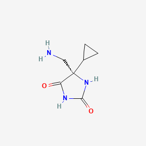 molecular formula C7H11N3O2 B8239971 (5S)-5-(aminomethyl)-5-cyclopropylimidazolidine-2,4-dione 