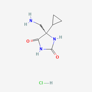 molecular formula C7H12ClN3O2 B8239974 (5S)-5-(aminomethyl)-5-cyclopropylimidazolidine-2,4-dione;hydrochloride 