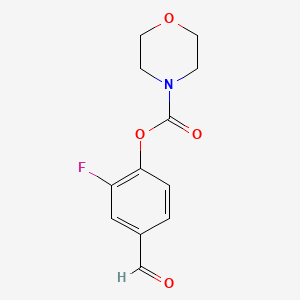 molecular formula C12H12FNO4 B8241231 2-Fluoro-4-formylphenyl morpholine-4-carboxylate 