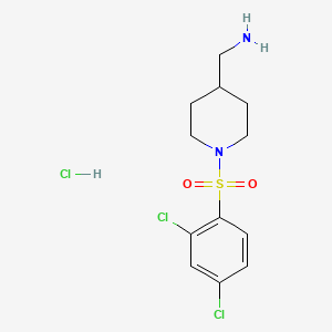 molecular formula C12H17Cl3N2O2S B8241359 (1-((2,4-Dichlorophenyl)sulfonyl)piperidin-4-yl)methanamine hydrochloride 