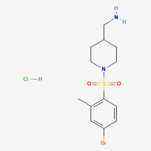 molecular formula C13H20BrClN2O2S B8241385 (1-((4-Bromo-2-methylphenyl)sulfonyl)piperidin-4-yl)methanamine hydrochloride 