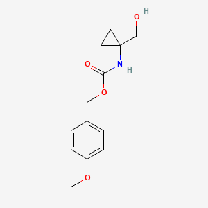 molecular formula C13H17NO4 B8242274 (4-Methoxyphenyl)methyl N-[1-(hydroxymethyl)cyclopropyl]carbamate 
