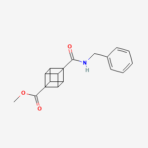 molecular formula C18H17NO3 B8243232 Methyl 4-(benzylcarbamoyl)cubane-1-carboxylate 