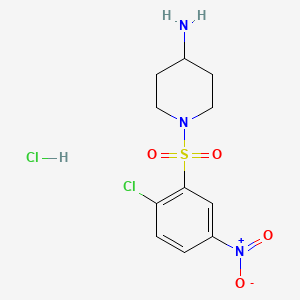 molecular formula C11H15Cl2N3O4S B8243791 1-((2-Chloro-5-nitrophenyl)sulfonyl)piperidin-4-amine hydrochloride 