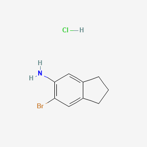 molecular formula C9H11BrClN B8246193 6-Bromo-2,3-dihydro-1H-inden-5-amine hydrochloride 