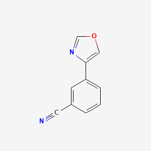 molecular formula C10H6N2O B8250176 3-(Oxazol-4-yl)benzonitrile 