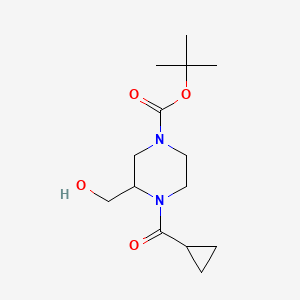 molecular formula C14H24N2O4 B8252911 tert-Butyl 4-(cyclopropanecarbonyl)-3-(hydroxymethyl)piperazine-1-carboxylate 