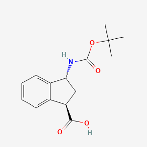 molecular formula C15H19NO4 B8257420 (1R,3R)-3-((tert-butoxycarbonyl)amino)-2,3-dihydro-1H-indene-1-carboxylic acid 