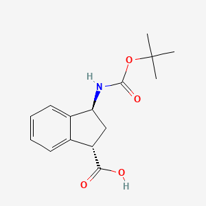 molecular formula C15H19NO4 B8257424 (1S,3S)-3-((tert-butoxycarbonyl)amino)-2,3-dihydro-1H-indene-1-carboxylic acid 