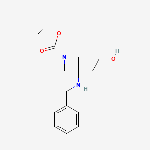 molecular formula C17H26N2O3 B8264152 Tert-butyl 3-(benzylamino)-3-(2-hydroxyethyl)azetidine-1-carboxylate 