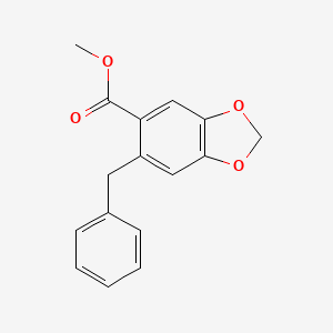 molecular formula C16H14O4 B8264956 Methyl 6-benzyl-2H-1,3-benzodioxole-5-carboxylate 