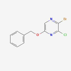 molecular formula C11H8BrClN2O B8266333 2-Bromo-3-chloro-5-phenylmethoxypyrazine 