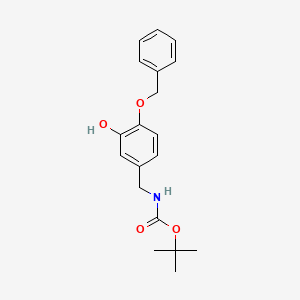 molecular formula C19H23NO4 B8266528 tert-butyl N-[(3-hydroxy-4-phenylmethoxyphenyl)methyl]carbamate 