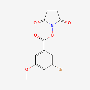molecular formula C12H10BrNO5 B8266949 2,5-Dioxopyrrolidin-1-yl 3-bromo-5-methoxybenzoate 