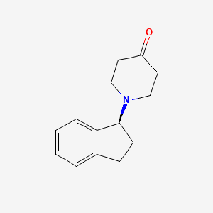 molecular formula C14H17NO B8269306 (S)-1-Indan-1-yl-piperidine-4-one 