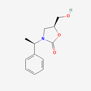 molecular formula C12H15NO3 B8270819 (5S)-5-(Hydroxymethyl)-3-[(1R)-1-phenylethyl]-2-oxazolidinone CAS No. 480424-72-4