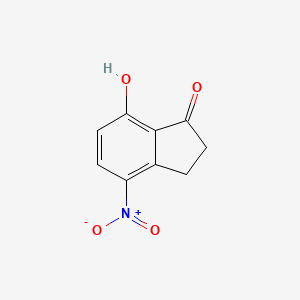 molecular formula C9H7NO4 B8272391 4-Nitro-7-hydroxyindan-1-one 