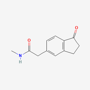 molecular formula C12H13NO2 B8291524 N-methyl(1-oxoindan-5-yl)acetamide 