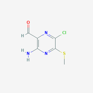 molecular formula C6H6ClN3OS B8293088 2-Amino-5-chloro-3-formyl-6-(methylthio)pyrazine 