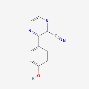 molecular formula C11H7N3O B8300396 3-(4-Hydroxyphenyl)pyrazine-2-carbonitrile 