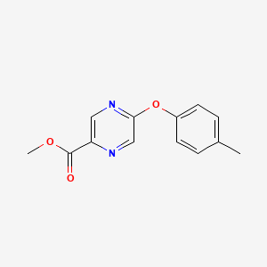 molecular formula C13H12N2O3 B8304042 Methyl 5-(4-methylphenoxyl)pyrazine-2-carboxylate 