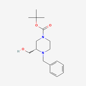 molecular formula C17H26N2O3 B8304685 tert-Butyl (3S)-4-benzyl-3-(hydroxymethyl)piperazine-1-carboxylate 