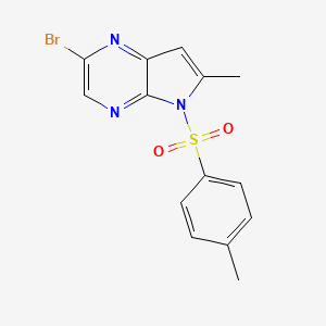 molecular formula C14H12BrN3O2S B8308052 2-bromo-6-methyl-5-tosyl-5H-pyrrolo[2,3-b]pyrazine 