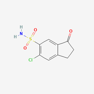 molecular formula C9H8ClNO3S B8308692 5-Chloro-6-sulfamoyl-1-indanone 