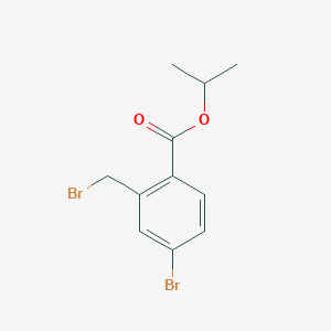 molecular formula C11H12Br2O2 B8311536 4-Bromo-2-bromomethyl-benzoic acid isopropyl ester 