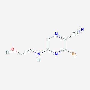 molecular formula C7H7BrN4O B8324031 3-Bromo-5-(2-hydroxy-ethylamino)-pyrazine-2-carbonitrile CAS No. 440124-26-5