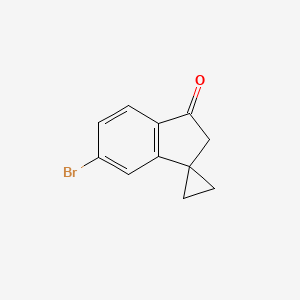 molecular formula C11H9BrO B8333113 6'-bromospiro[cyclopropane-1,1'-inden]-3'(2'H)-one 