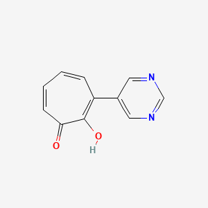 molecular formula C11H8N2O2 B8340702 2-Hydroxy-7-pyrimidin-5-yl-cyclohepta-2,4,6-trien-1-one 
