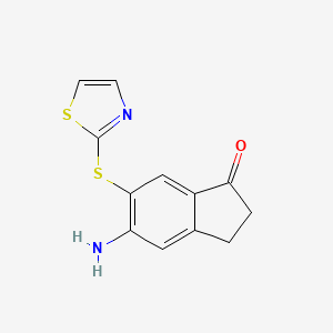 molecular formula C12H10N2OS2 B8357484 5-Amino-6-(2-thiazolylthio)-1-indanone 