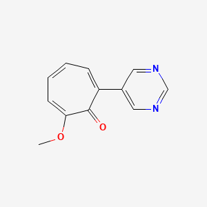2,4,6-Cycloheptatrien-1-one, 2-methoxy-7-(5-pyrimidinyl)-