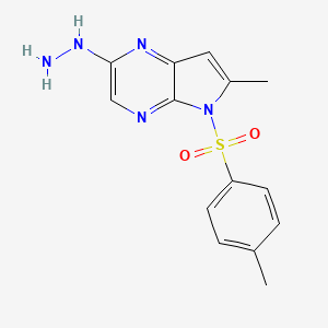 molecular formula C14H15N5O2S B8367325 2-hydrazinyl-6-methyl-5-tosyl-5H-pyrrolo[2,3-b]pyrazine 